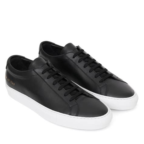 white soled black trainers